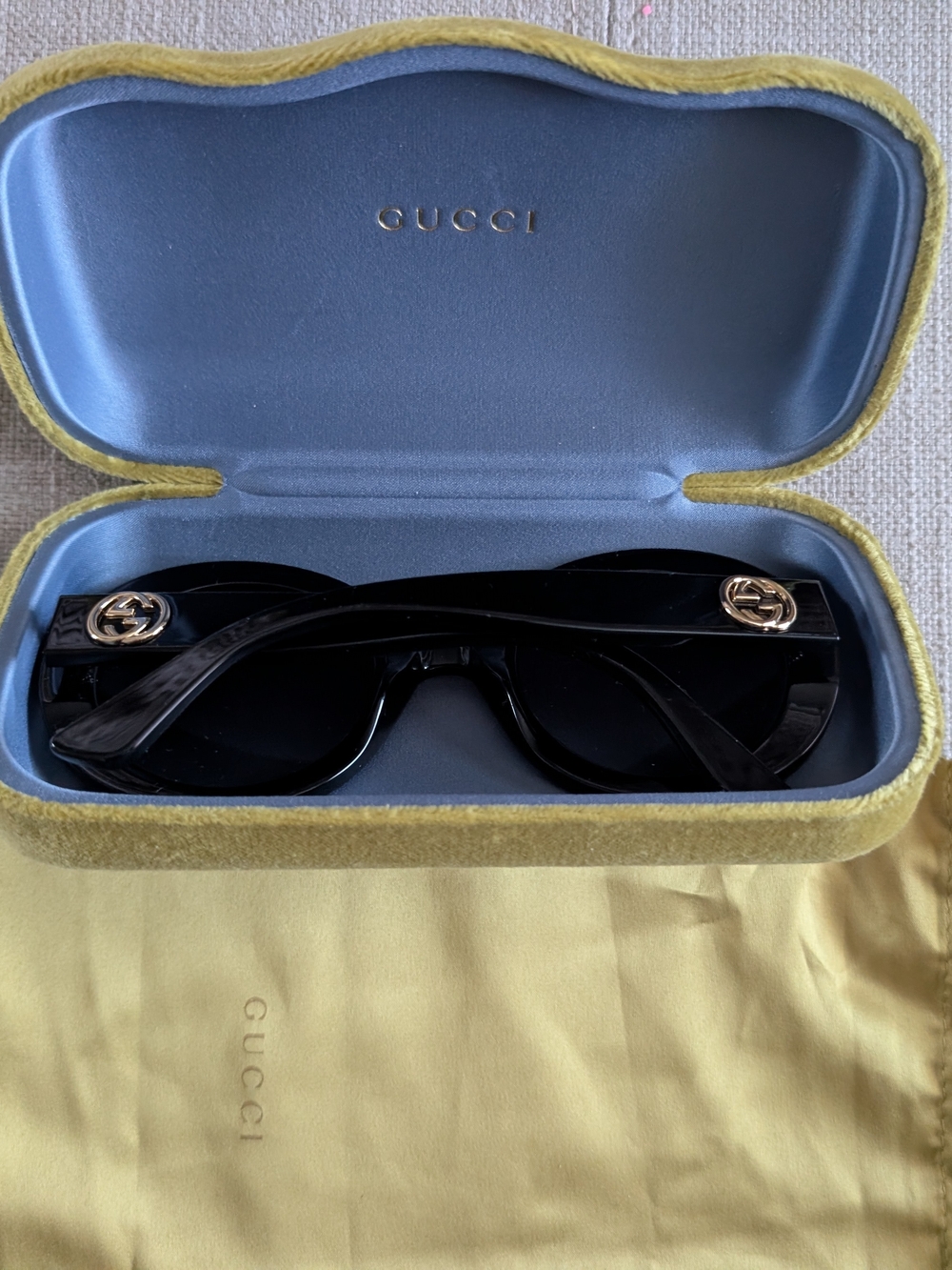 Gucci Black Sunglasses with Gold GG Medallions